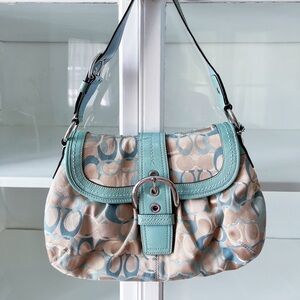 Turquoise gently used coach purse